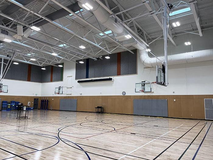 a gym with basketball hoops